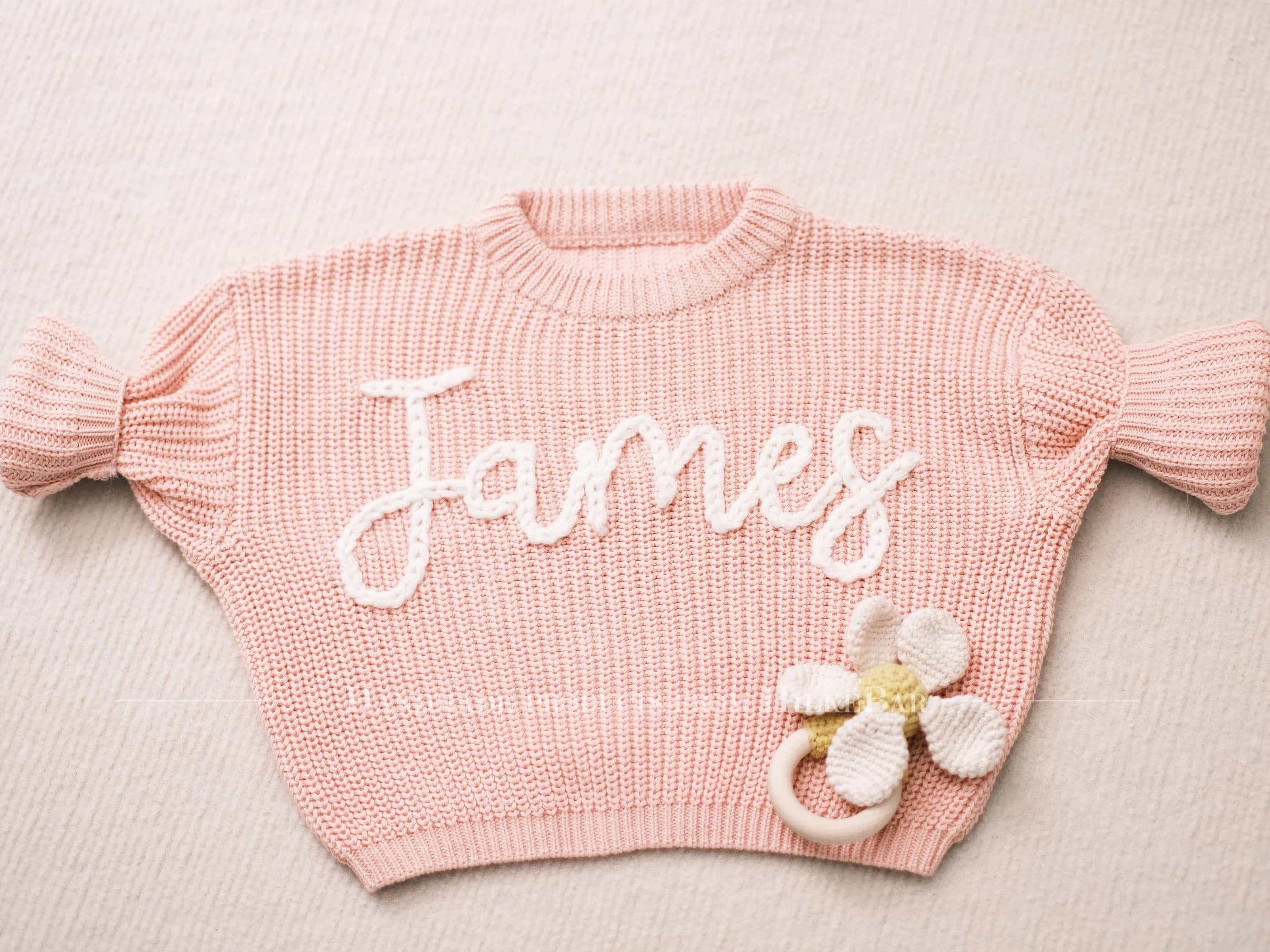 Cherished Custom Baby Sweaters: Personalize Their Name with Exquisite Embroidery