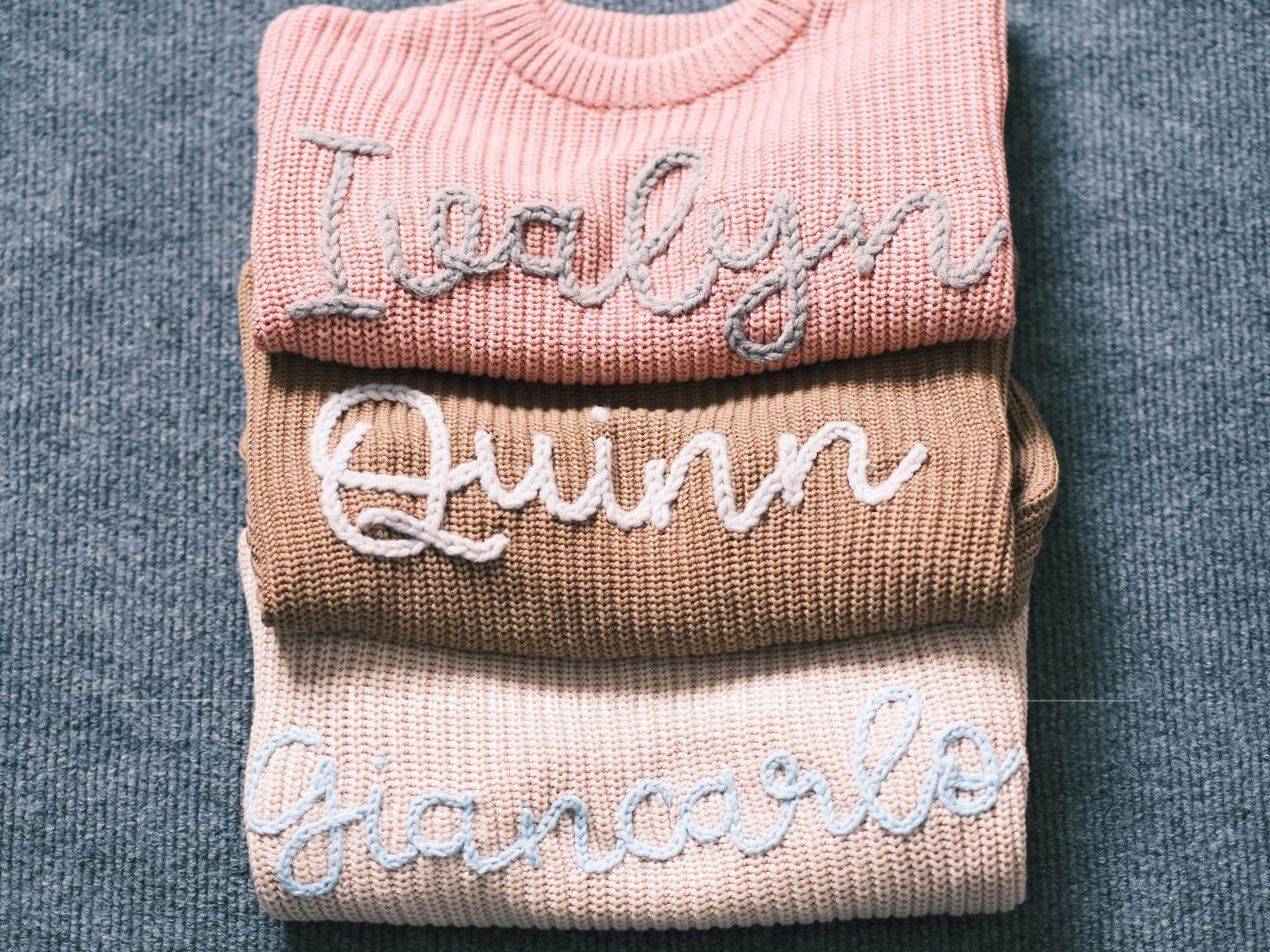 Cherished Custom Baby Sweaters: Personalize Their Name with Exquisite Embroidery
