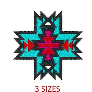 May include: A turquoise, red, and pink geometric design with black outlines. The design is in the shape of a cross and has a tribal pattern. The text "3 SIZES" is below the design.
