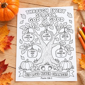 May include: A black and white coloring page featuring a large tree with hanging signs that read God Loves Me, I Am Blessed, God Is With Me, I Trust God, and God Hears Me. The text reads Through Every Season, God Is Good and His Love Never Changes.