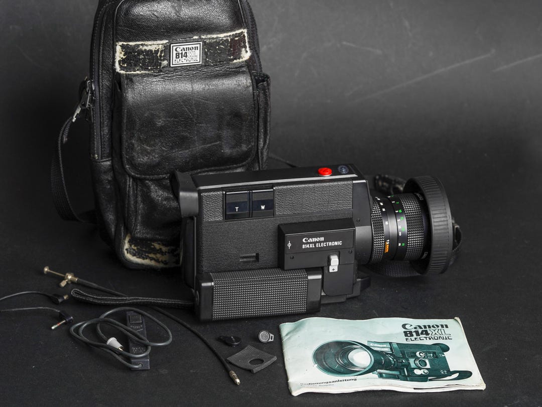 Canon 814 XL Electronic Super Camera With Auto Zoom Fully