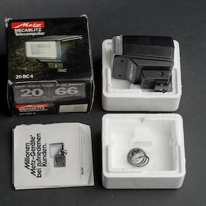 Metz Mecablitz 20BC4 Telecomputer Flash per fotocamere reflex a pellicola/fotocamere con telemetro/DSLR - Condizioni perfette - NOS - Nuovo/inutilizzato