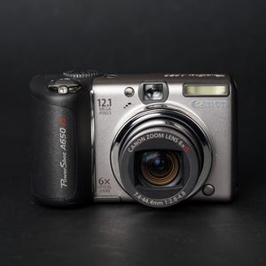 Canon PowerShot A650 IS 12.1MP Digital Camera Silver Tested & Fully Working Digicam