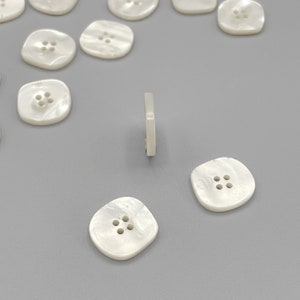 Bouton 15 mm irisé en polyester