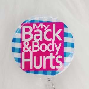 My Back & Body Hurts Badge Reel on a Glittery White Base- Interchangeable and Retractable