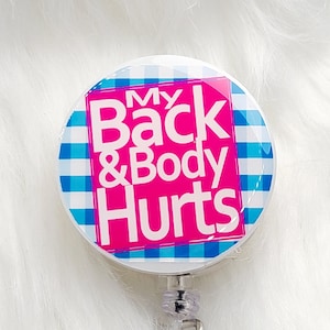 My Back & Body Hurts Badge Reel on a Solid White Base- Interchangeable and Retractable