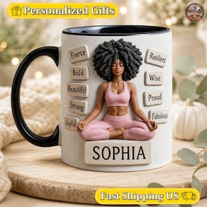 May include: A white ceramic mug with a black handle and interior featuring a raised 3D-style illustration of a person with dark curly hair sitting in a yoga pose. The mug displays the name SOPHIA and words including Fierce, Bold, Beautiful, Strong, Joyful, Resilient, Wise, Proud, and Fabulous.