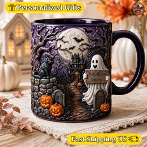 May include: A dark purple ceramic mug featuring a raised, textured Halloween scene with a black cat on a stone wall, a haunted house, a full moon, bats, and a white ghost holding a wooden sign that reads Sophia's house, with orange pumpkins.
