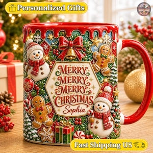 May include: A ceramic mug with a red handle and rim, featuring a festive Christmas theme. The surface displays embossed snowmen, gingerbread cookies, gift boxes, and a central hexagonal plaque with the text Merry Merry Merry Christmas Sophia.