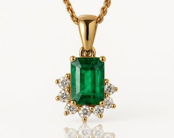 May include: A gold pendant necklace featuring a rectangular emerald gemstone surrounded by small, round diamonds. The emerald is a vibrant green color, and the diamonds sparkle. The necklace chain is also gold.