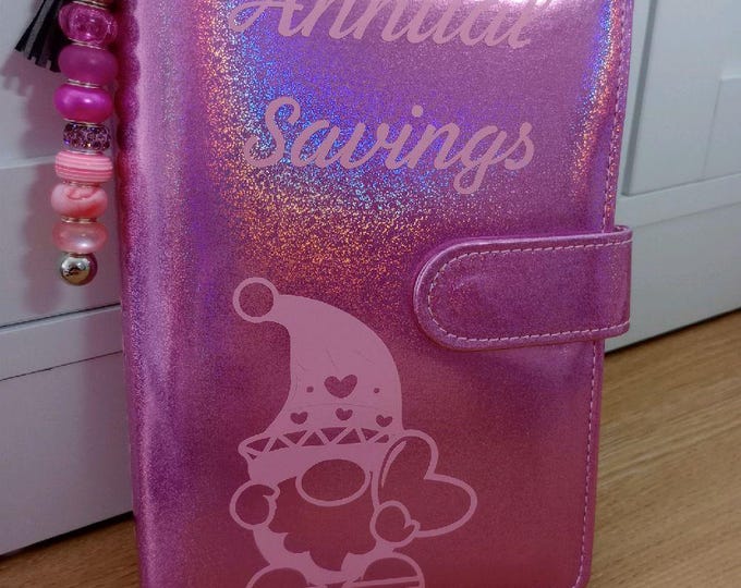 Gonks themed annual savings binder including 12 months of the year vellums and trackers saving 120 per month.