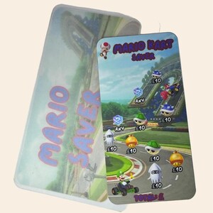 Tarjeta de seguimiento de ahorro de Mario con sobre de vitela a juego para adaptarse a una carpeta de tamaño A6 para guardar efectivo. Ahorre un total de 80 más 2 íconos misteriosos.
