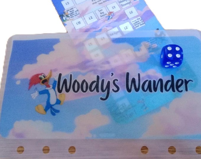 Woody's wander savings card and matching vellum. includes dice.