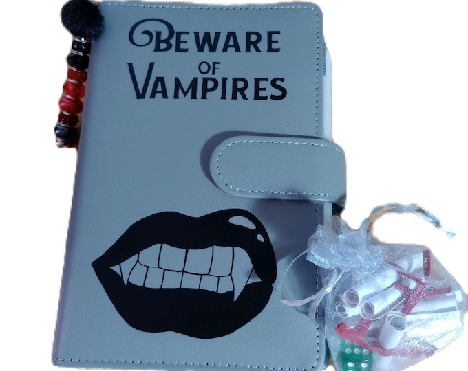 Ultimate vampire savings binder, featuring 12 main savings trackers and extra mini challenges and scratch off cards