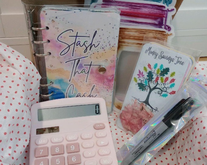 Cash stuffing starter box. includes binder, coin saving trackers 1p to 2, calculator, 6 trackers, pen, 3 coin pouches and 6 binder wallets