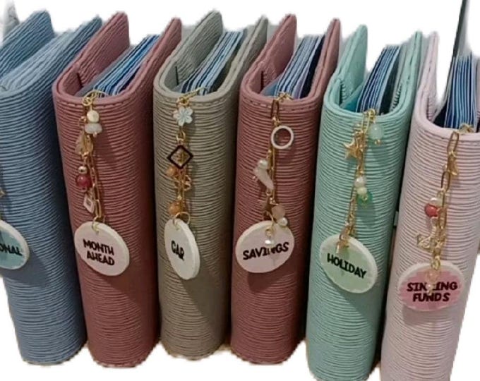 Binder clip charms for any size or colour binder. handmade and customised to your requirements.