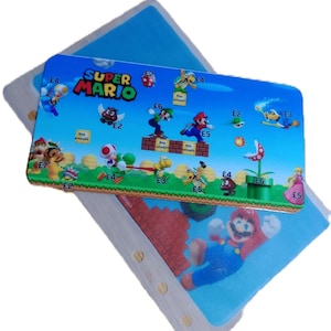 Super Mario Themen-Tracker-Karte mit passendem Pergamentumschlag für Ordner im Format A6.