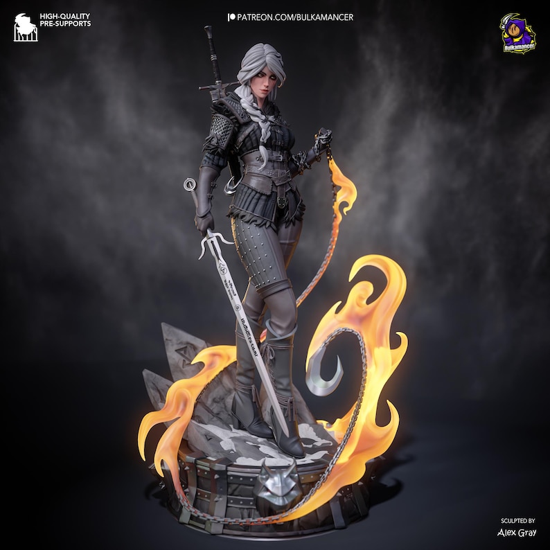 May include: A detailed statue of a woman with white hair, clad in dark armor, holding a sword and a chain with flames. The base is a stone-like structure with a metal emblem. The statue is sculpted by Alex Gray.