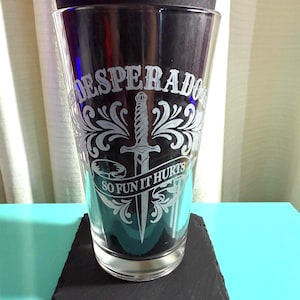 Desperado Club Pint Glass – Dungeon Crawler Inspired Etched Beer Glass, Funny Fantasy LitRPG Gift