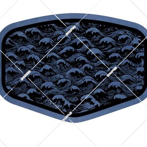 May include: A decorative, shield-shaped design featuring a stylized ocean wave pattern. The waves are depicted in shades of blue and black, set within a dark blue border. The design has a textured appearance, suggesting a carved or embossed effect.