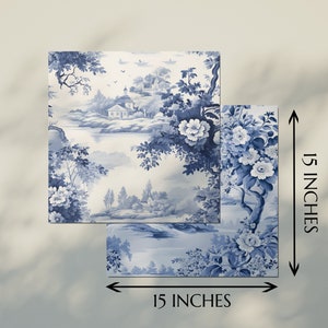 May include: Two 15-inch square blue and white porcelain tiles with a floral and landscape design. The tiles feature a blue and white floral pattern with a landscape scene of a house and trees.