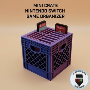 May include: A purple and blue plastic mini crate game organizer for Nintendo Switch game cartridges. The crate has a handle on the side and slots for 12 game cartridges. Two game cartridges are shown in the slots. The text "NINTENDO SWITCH" is printed on the top of the crate.