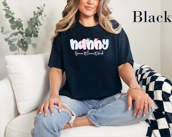 Comfort Colors® Custom Nanny Coquette Bow Shirt - Personalized Floral Nanny Tee with Grandkids' Names, Mother's Day Gift for Nanny