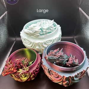 Huevo de dragón rosa: Dragón articulado en su interior