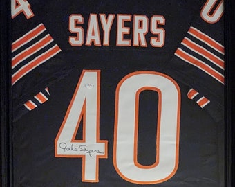 Gale Sayers Autographed Jersey (framed in display case with COA)