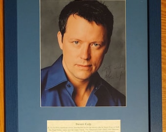 Gesigneerde foto door Steven Culp (vertrouwde bron)