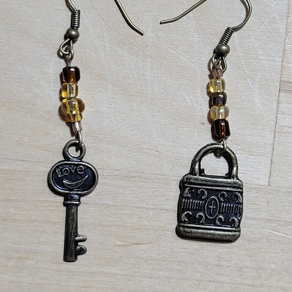 Antique gold lock and key earrings with fishhook wires and brown beads, with 1 3/4 inch dangle