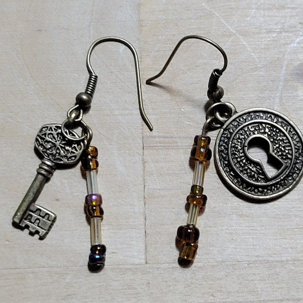 Antique gold key and keyhole earrings with fishhook wires and brown beads, with 1 1/2 inch dangle