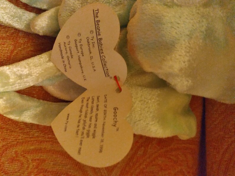 The Beanie Baby Collection. Goochy Born November 18, 1998. One of the