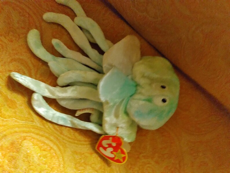 The Beanie Baby Collection. Goochy Born November 18, 1998. One of the