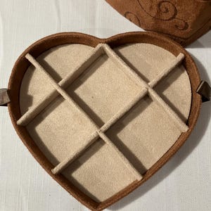 May include: A rustic wooden sign with the text "Welcome to our home" in a handwritten style. The sign features a distressed finish and a simple, inviting design, perfect for a front porch or entryway.