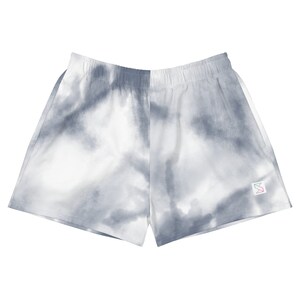 May include: Gray tie-dye shorts with a small logo on the right side.