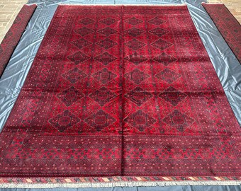 Handmade Afghan Kalisa Rug: 8.1x11.5 Red Wool Area Rug