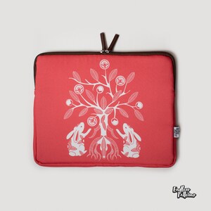 Minimalist laptop sleeve for work or travel. Perfect for protecting laptops, tablets, or tech accessories in style.