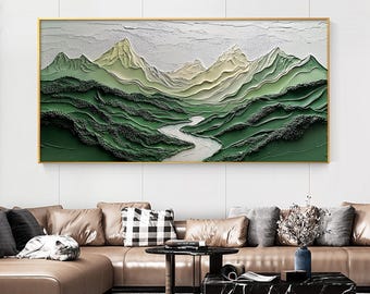 May include: A framed abstract landscape painting with a green and white color scheme. The painting depicts a winding river flowing through a valley surrounded by mountains. The mountains are layered and textured, creating a 3D effect.