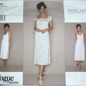 May include: A sewing pattern for a dress, featuring three different styles. The pattern is from Vogue Patterns and is designed by Marc Jacobs. The pattern number is 1965 and the sizes are 12-14-16.