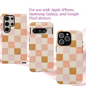 May include: Phone cases with a checkerboard pattern in shades of beige, peach, and brown. The cases are designed for Apple iPhone, Samsung Galaxy, and Google Pixel devices. The text on the image reads: "For use with Apple iPhone, Samsung Galaxy, and Google Pixel devices."