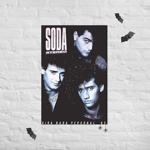 May include: A black and white poster featuring the band Soda Stereo with the text SODA STEREO and GIRA NADA PERSONAL '85. The image displays three band members with 1980s hairstyles, set against a dark background with small bat silhouettes.