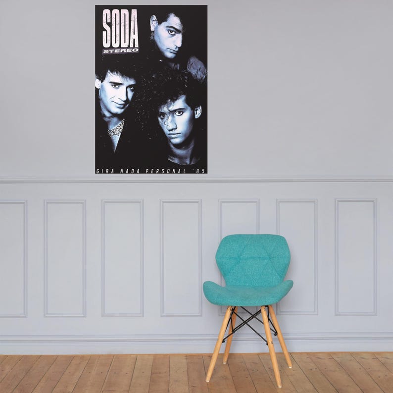 May include: A black and white rectangular poster featuring the band Soda Stereo with the text SODA STEREO and GIRA NADA PERSONAL 85. The poster displays three band members in a portrait arrangement with high contrast lighting and dark shadows.