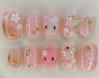 Handpainted cherry blossom hk Press On Nails, y2k nails, 3D art nails, long lasting press ons, Pinterest press ons, hell0 Kitty nails,Sakura