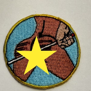 Mature item Caning Merit Badge