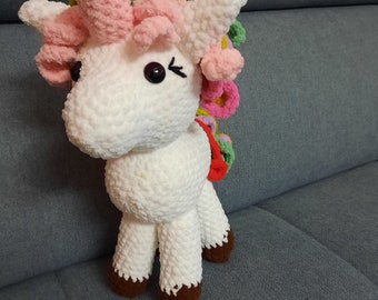 Crocheted unicorn with rainbow mane
