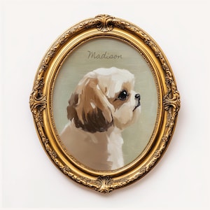 May include: An oval-shaped, gold-colored ornate frame surrounds a portrait of a dog. The dog is white and brown with black eyes and is painted on a light green background. The name "Madison" is written above the dog.