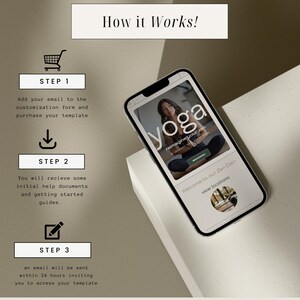 May include: A smartphone displaying a website for a yoga studio. The website features a photo of a woman practicing yoga and the text "yoga reimagine your zen". The website also includes a "Welcome to our Zen Den" message and a button to "view locations".