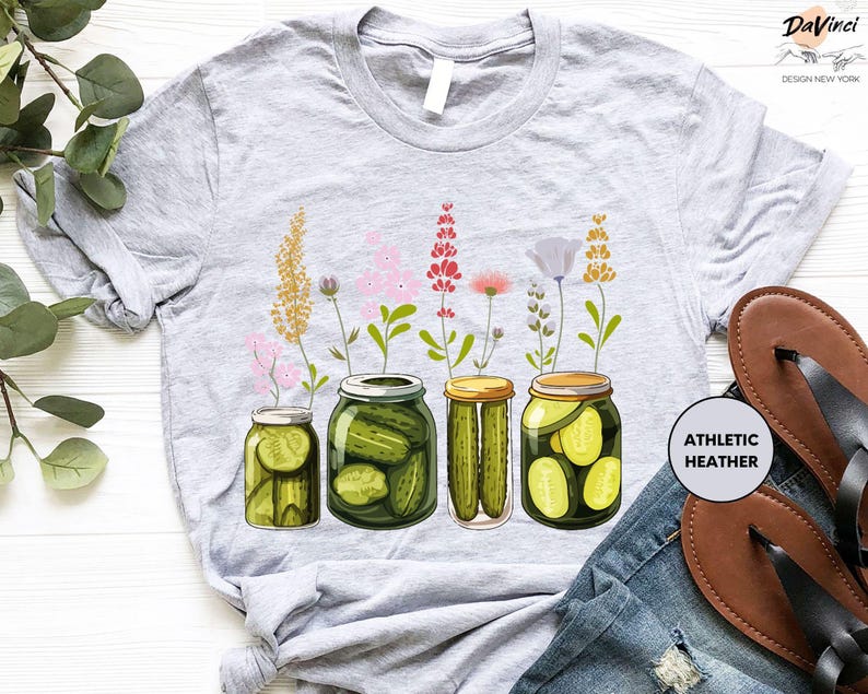 a t - shirt with pickles and flowers on it