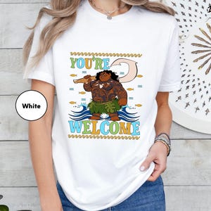 a woman wearing a white t - shirt that says you're 2, we